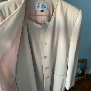 2 piece tan, lined ladies suit.